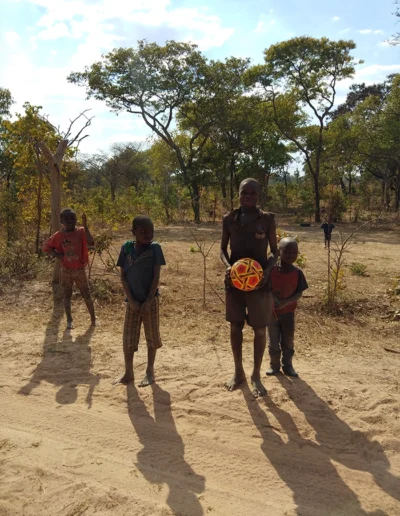 Delivering balls to the village children